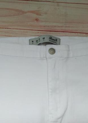 Стрейчевые джинсы скинны с прорезами на коленях* высокая посадка2 фото