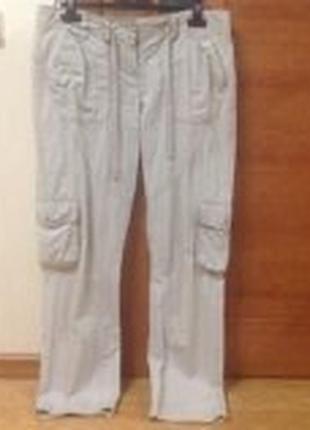 Брюки фирмы benetton.