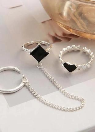 Сет кольца с цепочкой и черным кристаллом сердечко серебристые бижутерия5 фото