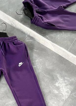 Штани nike purple2 фото