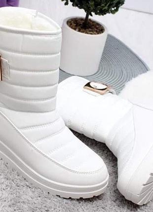 Стильные теплые зимние сапоги