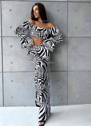 Жіночий костюм ✔️мод.71/7/50 топ +   штани кльош принт зебра (42-44,46-48  розмір)2 фото
