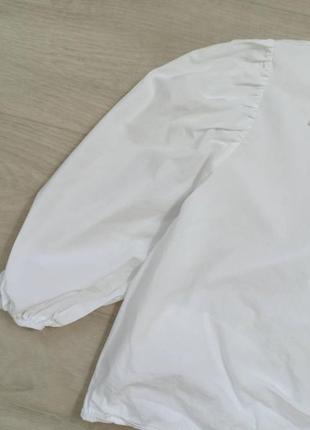 Белая коттоновая блуза на запах с объёмными рукавами3 фото