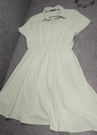 Женское платье с расклешенной юбкой светло-зеленого цвета 46-48-50 размера4 фото