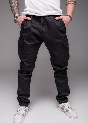 👖 штани джогери чорного кольору з накладеними кишенями4 фото
