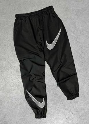 Брюки nike (новые, черные)2 фото