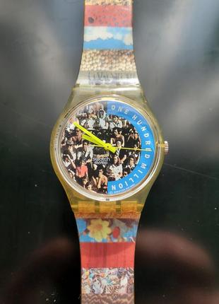 Swatch one hundred million кварцевые часы1 фото