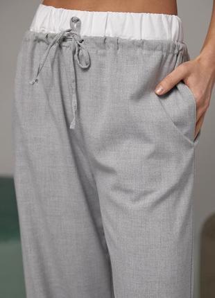 Женские брюки на завязках с белой резинкой на талии3 фото