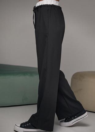 Женские брюки на завязках с белой резинкой на талии2 фото
