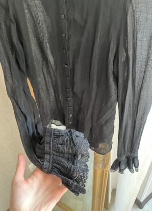 Прозрачная женская блузка черного цвета