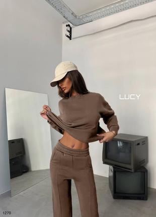 Стильный костюм брюки с высокой посадкой снизу разрезы укороченная кофта7 фото