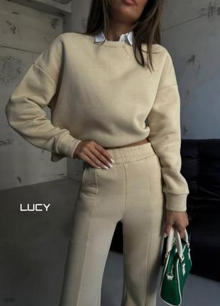 Стильный костюм брюки с высокой посадкой снизу разрезы укороченная кофта4 фото