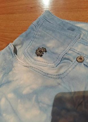 Бело-голубые джинсы6 фото