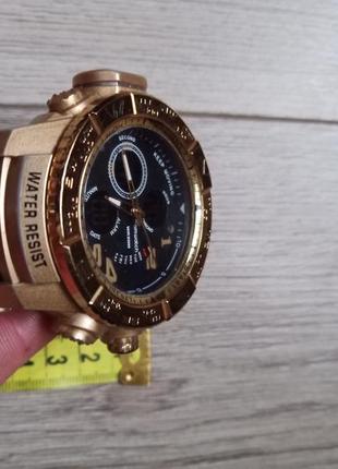 Часы в золотом цвете comwatch water resist.3 фото