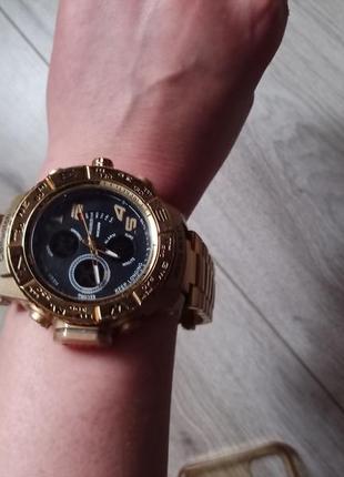 Часы в золотом цвете comwatch water resist.7 фото