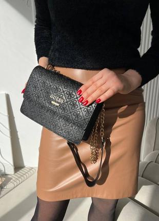 Guess heart black logo