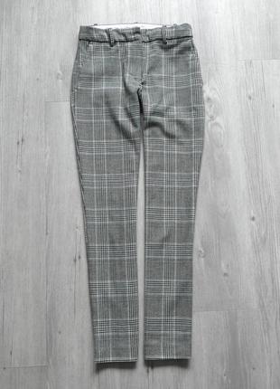 Зауженные брюки в крупную клетку