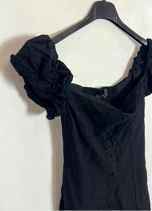 Дуже коротенька  сукня чорна6 фото