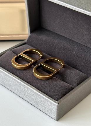 Брендові сережки в позолоті