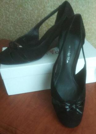 Летние туфли на танкетке.