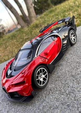 Машинка bugatti chiron supercar на радіоуправлінні червона. машинка на пульті радіокерування, на акумуляторі