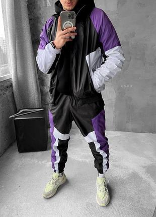 Чорно фіолетовий спортивний костюм чоловічий вітрозахисний