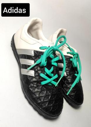 Кроссовки футбольные на мальчика черного белого цвета с бирюзовыми шнурками от бренда adidas 30