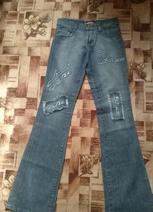 Джинсы клёш