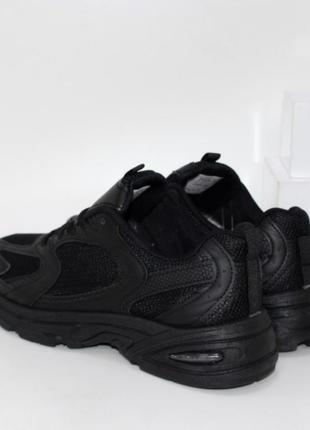 Черные кроссовки с текстильными вставками3 фото
