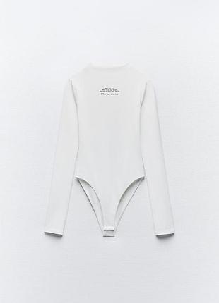 Поліамідне боді з написом3 фото