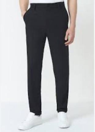 Стильные классические шерстяные  тёмно-синие брюки размер s с защипами с карманами в полоску