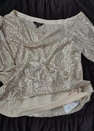 Женская нарядная блуза с пайетками и опущенным плечом4 фото