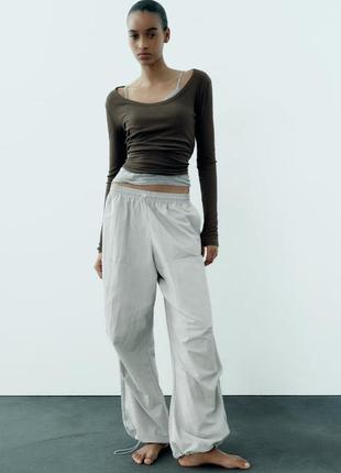 Нейлонові штани zara