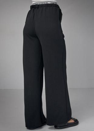 Трикотажні жіночі штани з подвійним поясом6 фото