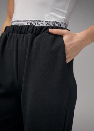 Трикотажні жіночі штани з подвійним поясом7 фото