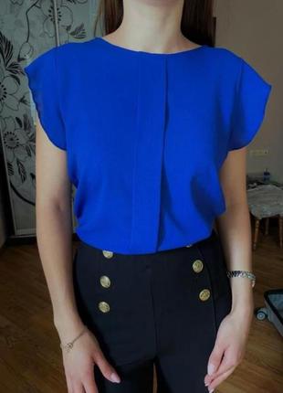 Блузка синего цвета шифоновая1 фото