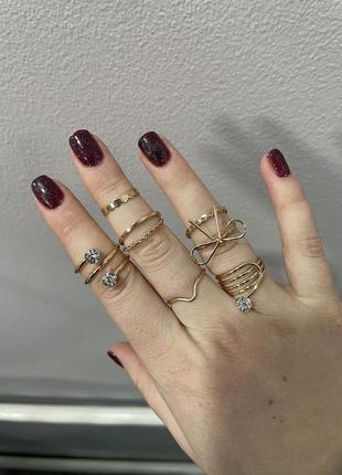 Набор колец кольцо кольцо в цвете золота с камушками2 фото