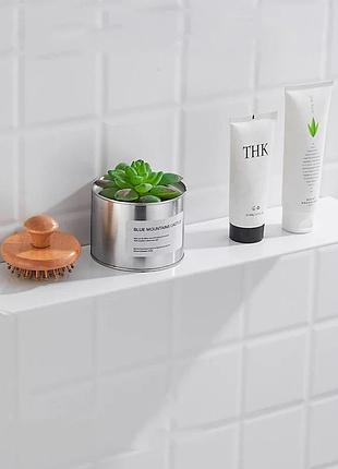 Біла поличка для ванної