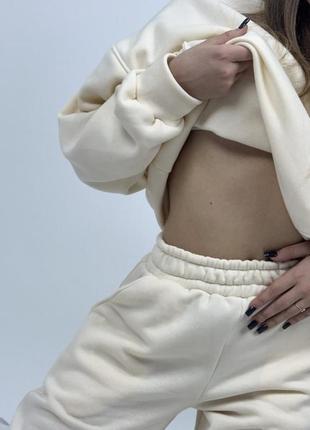 Женский теплый костюм штаны и худи с капюшоном флисовый костюм на резинке молочный цвет размер 42-483 фото
