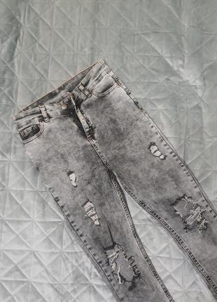 Сірі джинси скінні рвані1 фото
