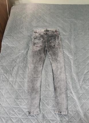 Сірі джинси скінні рвані10 фото