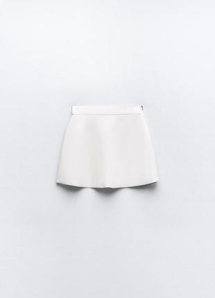Короткая юбка с эффектом неопрена7 фото