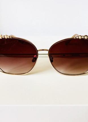 Элегантные солнцезащитные очки с жемчугом2 фото