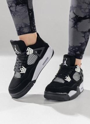 Женские кроссовки air jordan 4 retro black white thunder7 фото