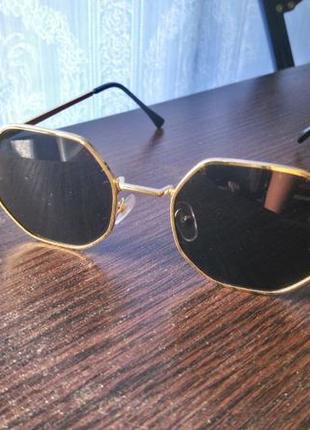Солнцезащитные очки круглые шестиугольные в тонкой оправе1 фото