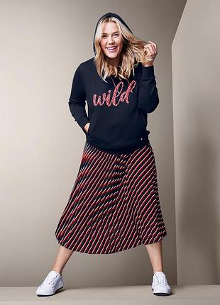 Плісерована спідниця.