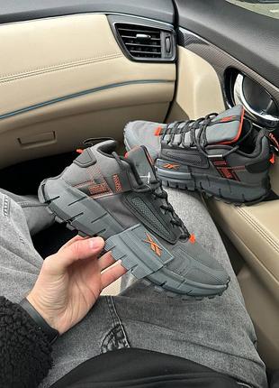 Чоловічі кросівки сірі з помаранчевим у стилі reebok zig kinetica edge dark grey orange1 фото