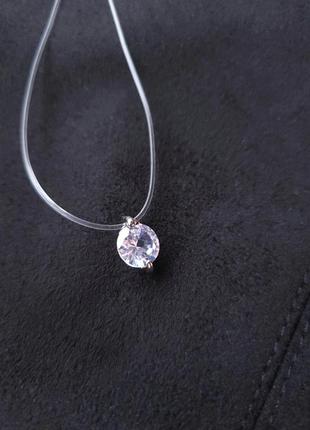 Кулон прозорий камінчик на волосні-резинці під срібло з подвійним кріпленням .