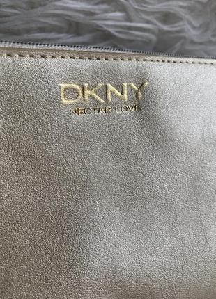 Золотистий клатч dkny9 фото