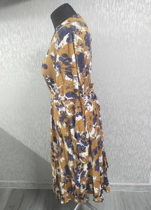 Дивовижно гарна асиметрична сукня з кишенями3 фото
